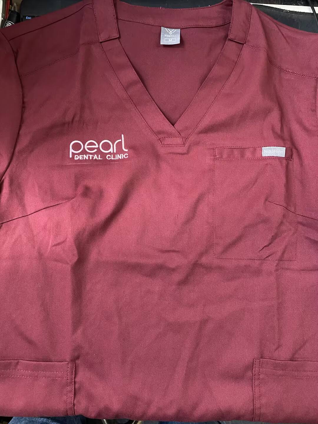 What Are the Benefits of Custom Embroidery on Medical Scrubs?