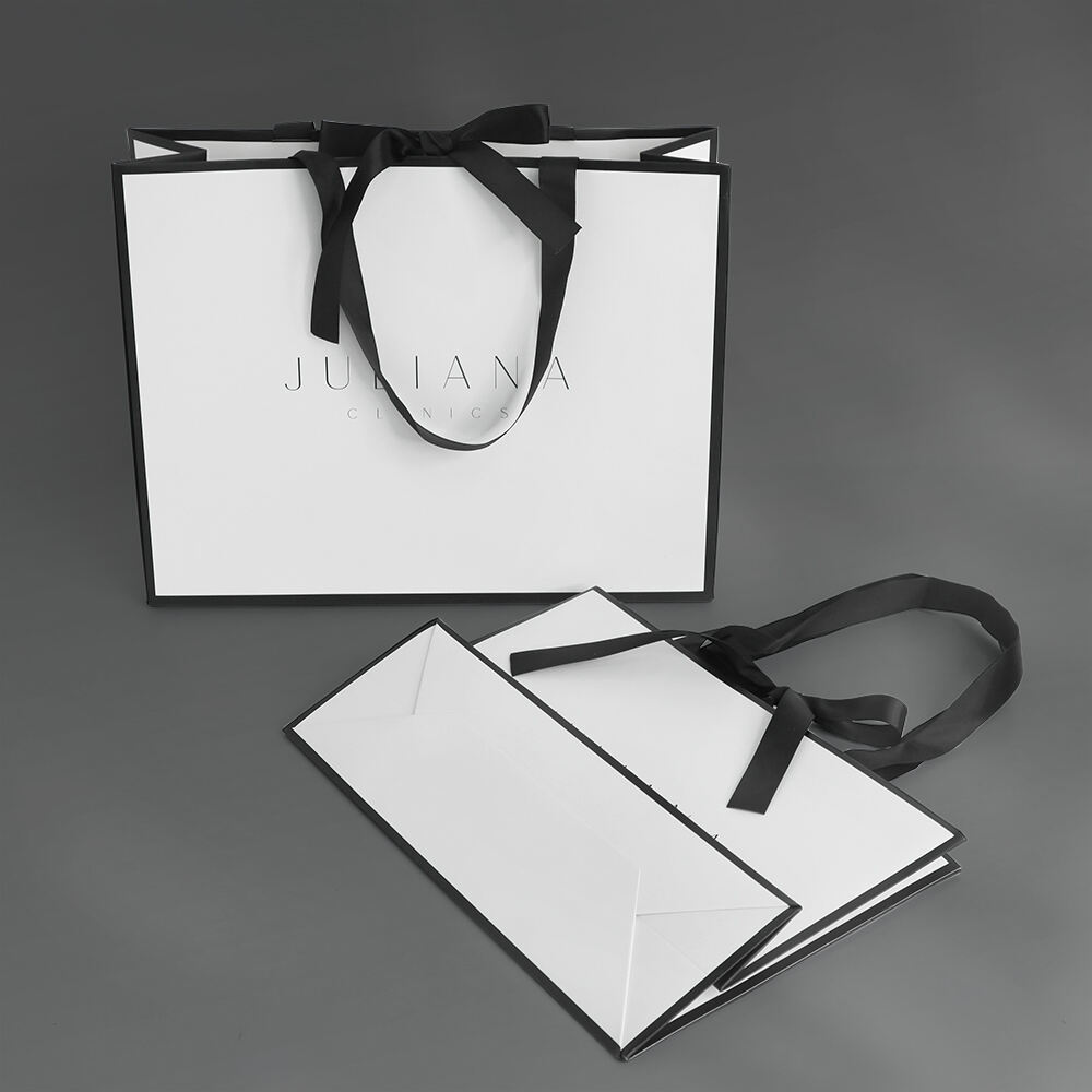 Custom Logo Luxury Ivory Paper Apparel Packaging Gift Shopping Bag With Ribbon Handle