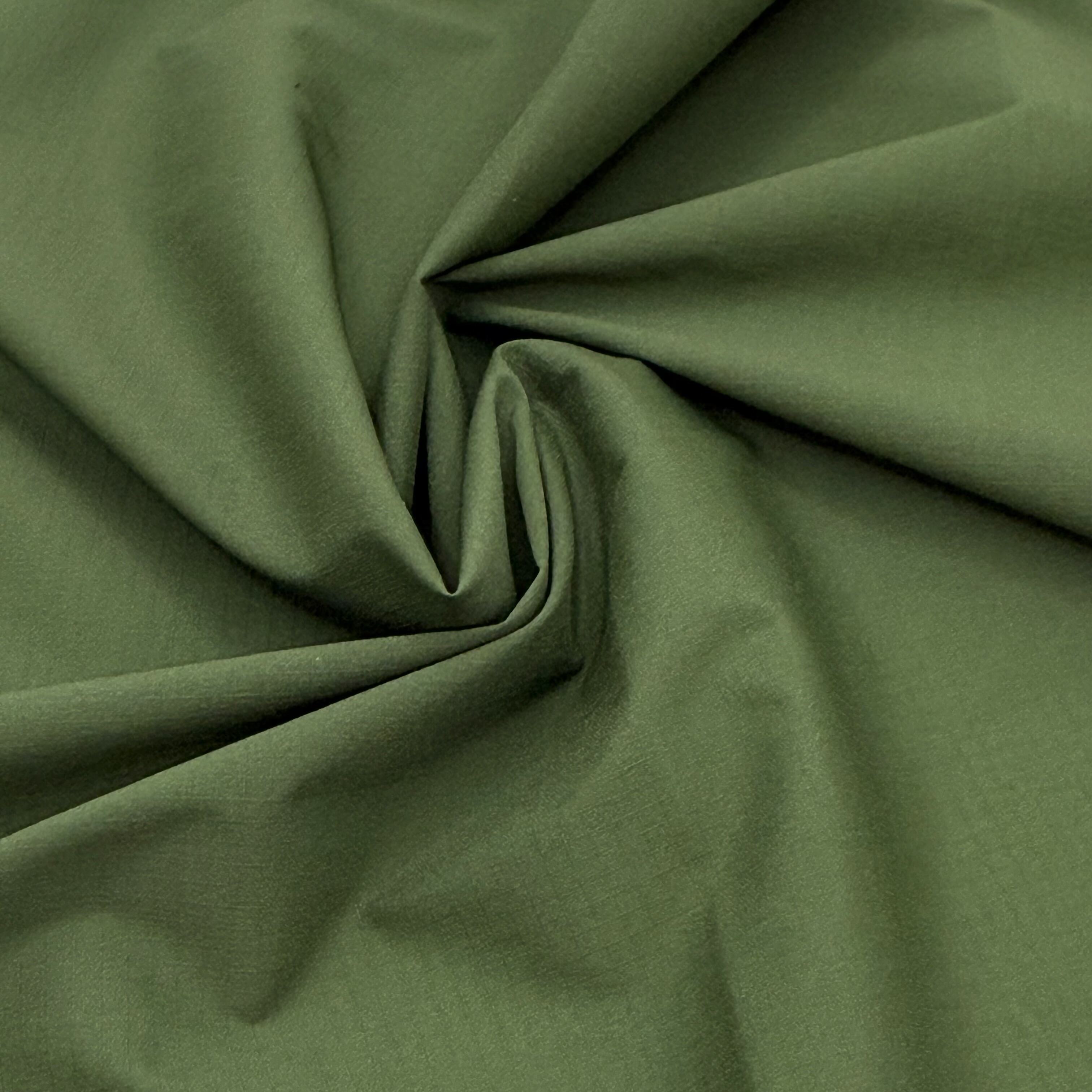 In che modo il tessuto in nylon, spandex e poliestere migliora comfort e durata nei capi d'abbigliamento