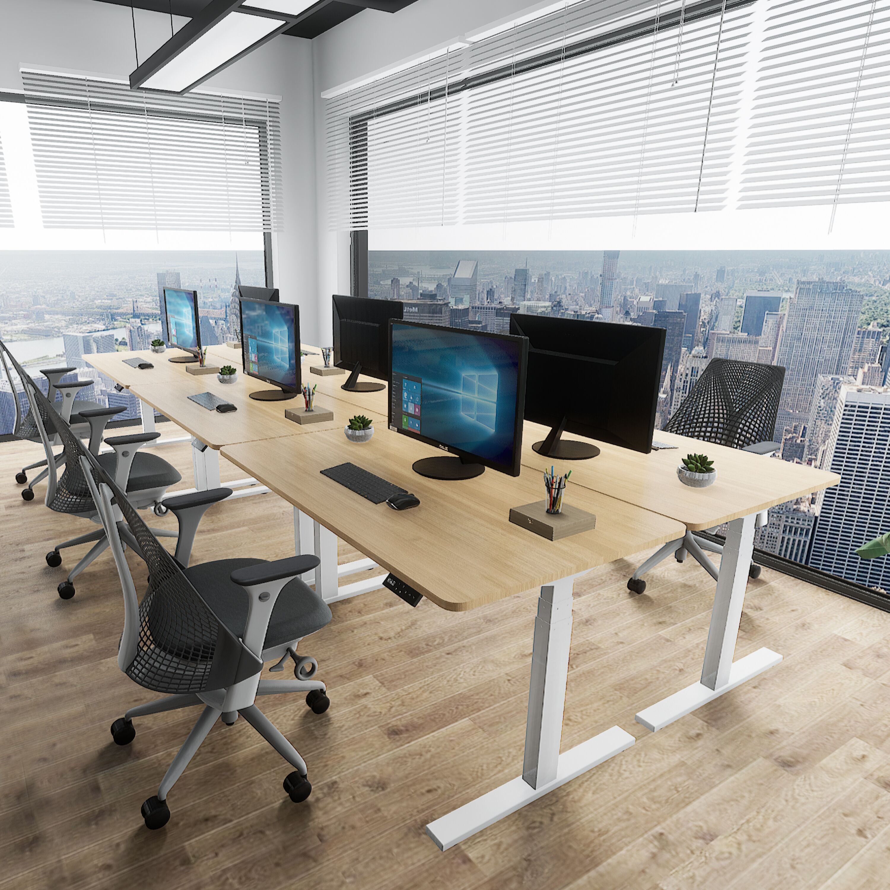 El futuro del diseño de oficinas: Aceptar las mesas ajustables en altura