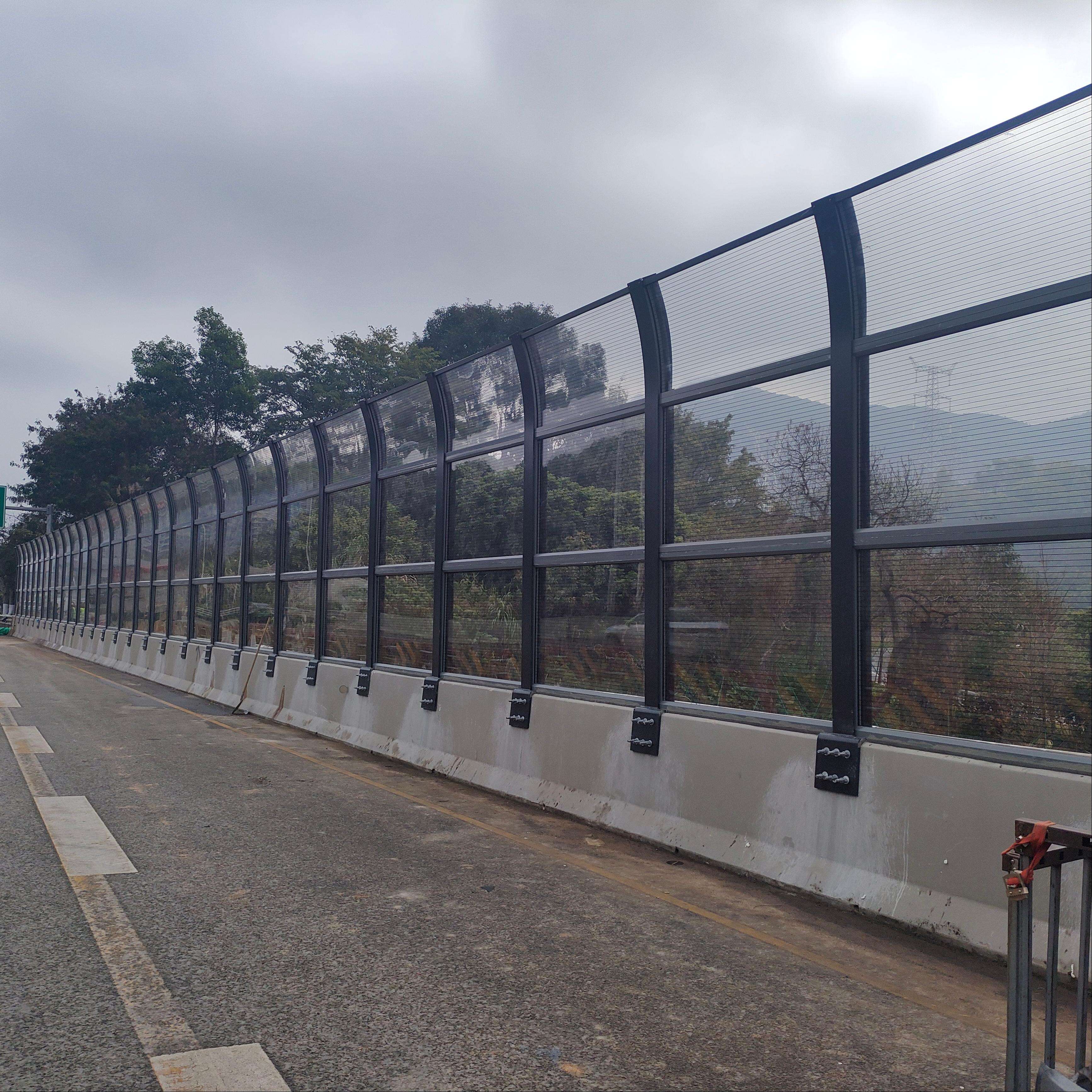 The Benefits of Installing a Road Noise Barrier on Your Property