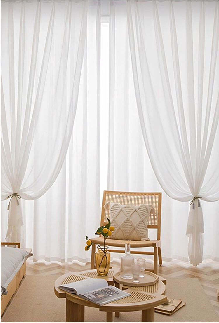 Cotton-feel bamboo slub sheer curtains styled with tiebacks, elegant drape for a cozy, light-filled interior.