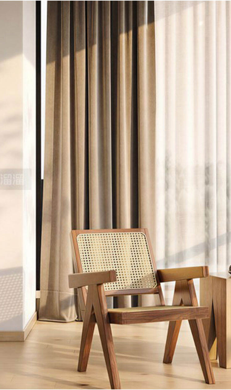 Warm taupe chenille blackout curtains in a modern room, heavy drape with soft daylight filtering at window