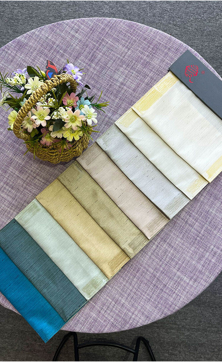 Layered window styling with dark sheer and blackout curtain—soft daylight and privacy control