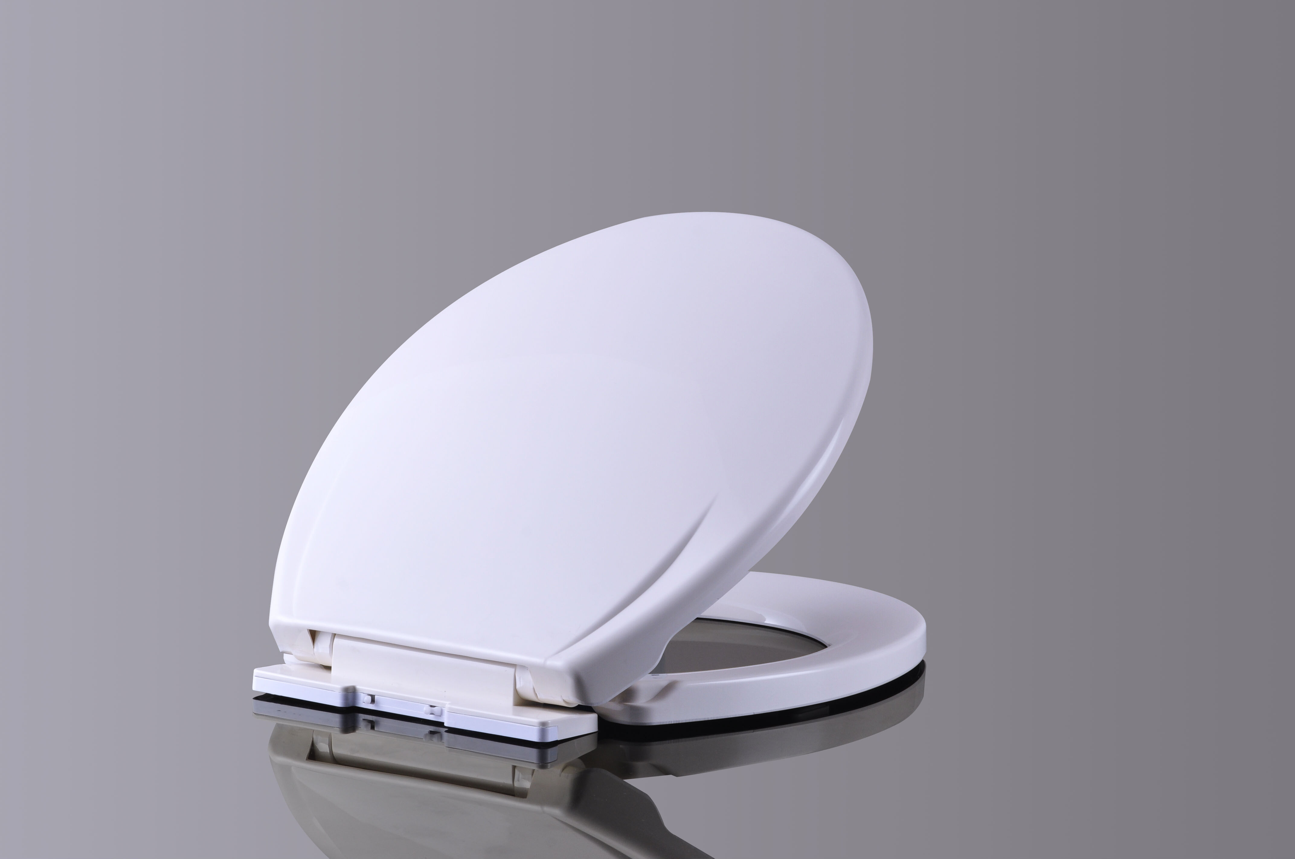Why Is a Round Plastic Toilet Seat a Practical Choice for Compact Bathrooms?