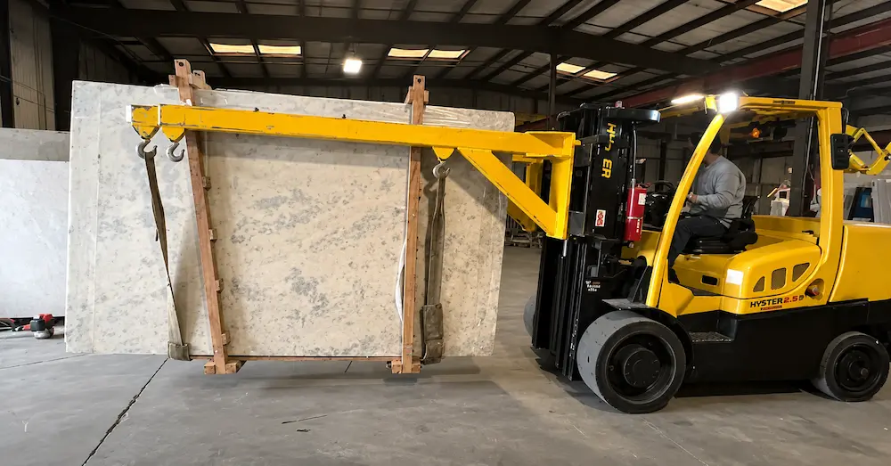 forklift-boom-unloading-marble-slabs.webp