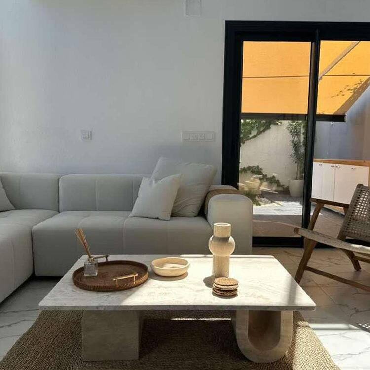 antique travertine coffee table.jpg