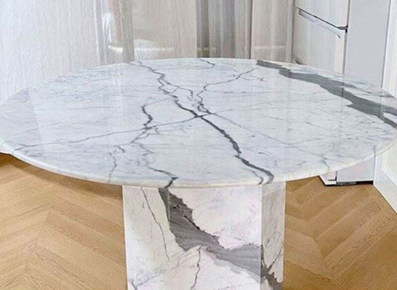 round marble dining table.jpg