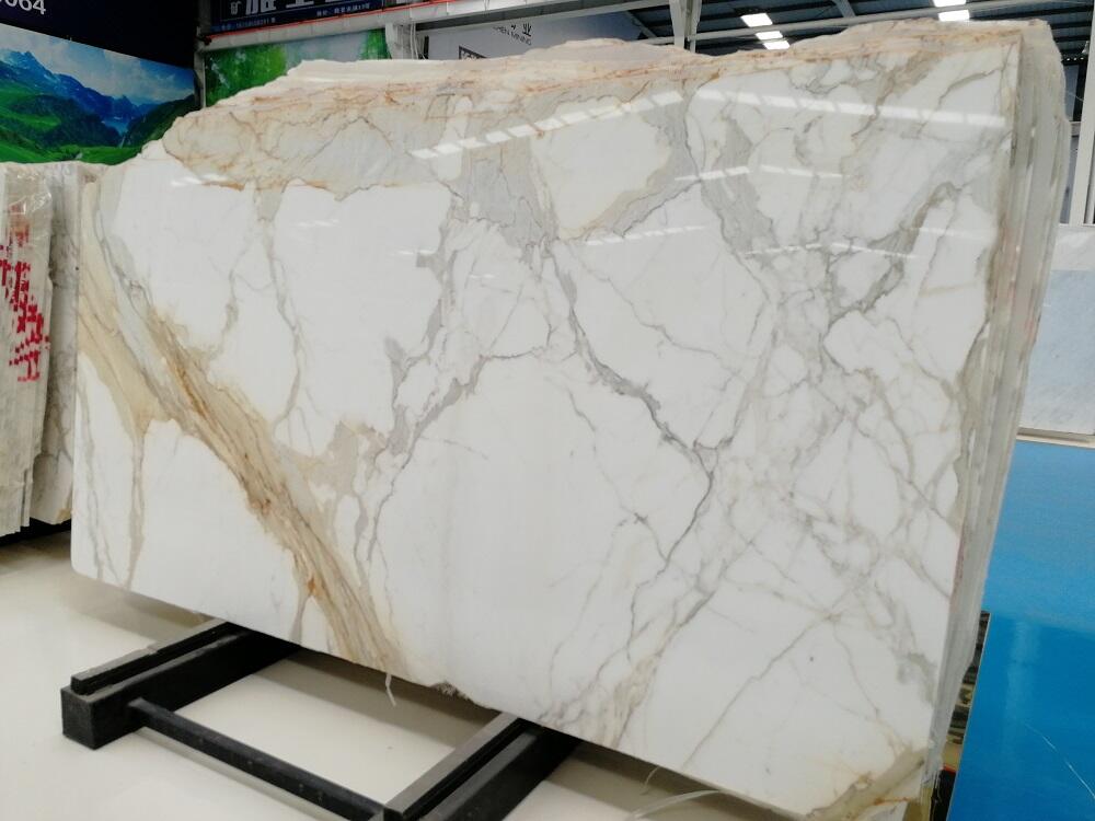 guia de Preços e Tendências de Mercado do Mármore Calacata Dourado em 2025