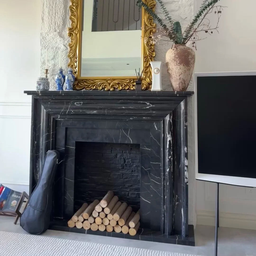 Nero Marquina Marble fireplace.jpg
