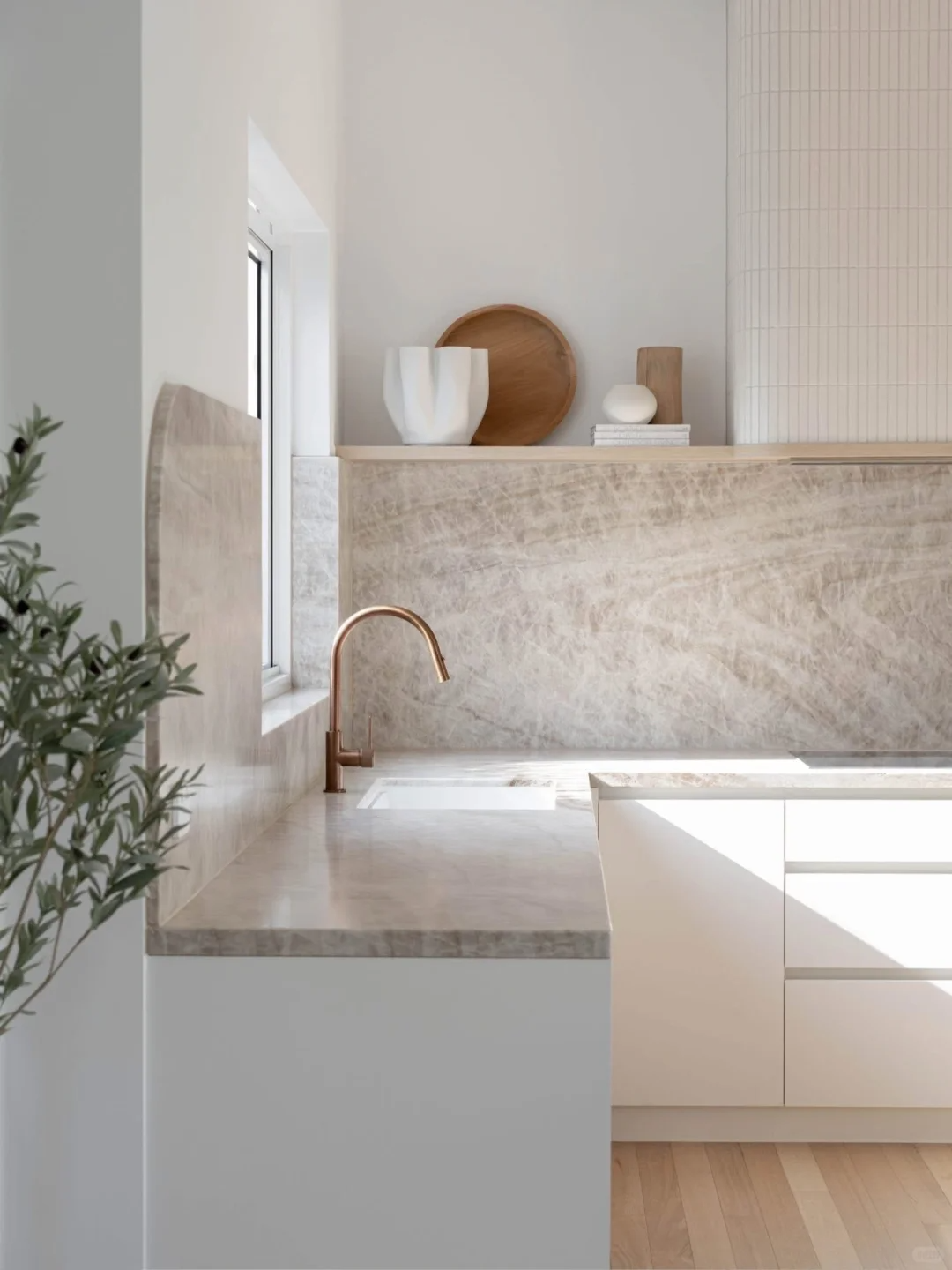 taj mahal quartzite with white cabinets (1).png