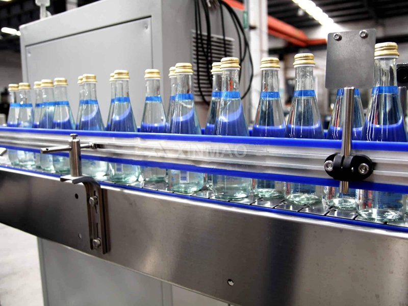 What features make a water bottle machine suitable for high volume production