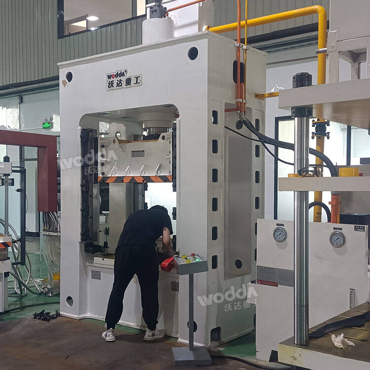 On-site commissioning of hydraulic press for automotive interior parts molding