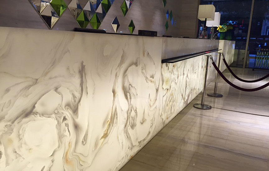 What advantages does translucent stone offer for interior decoration projects?