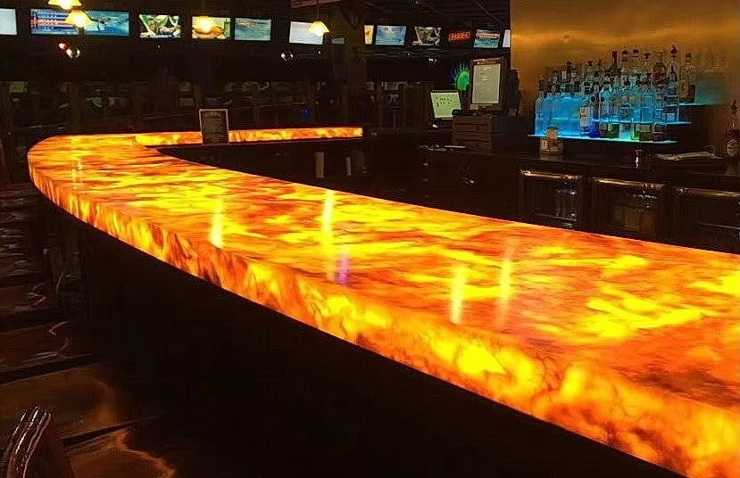 What characteristics make artificial stone countertops popular with businesses?