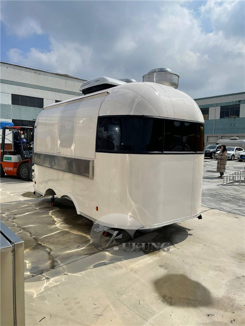 UKUNG vintage airstream style concession food trailer with car painting outside, food trucks equipped with snacks machines supplier