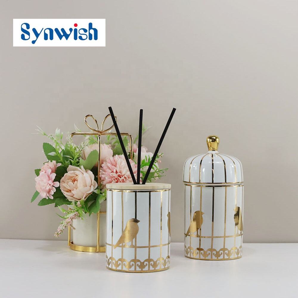 Design Empty White Luxury Embossed Ceramic Candle Jars Containers With Metal Swan Lid Unique Ceramic Reed Diffuser Vessels factory