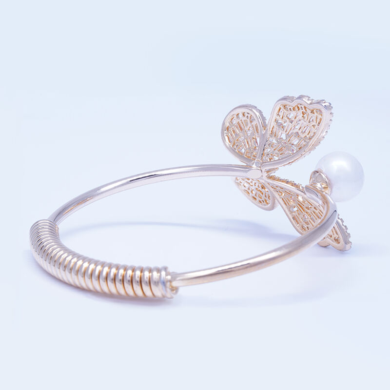 Trendy butterfly design rose gold plated pearl bangle for women