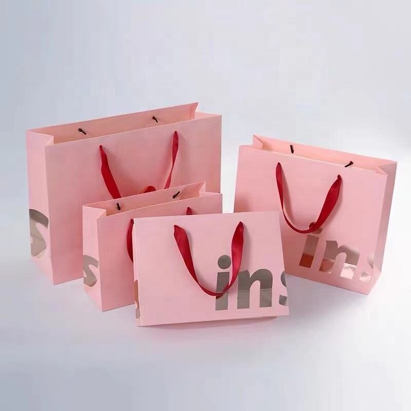 Custom Recycled Shopping Paper Bags Packaging Gift Bag With Ribbon Handle For Clothes With Your Own Logo factory