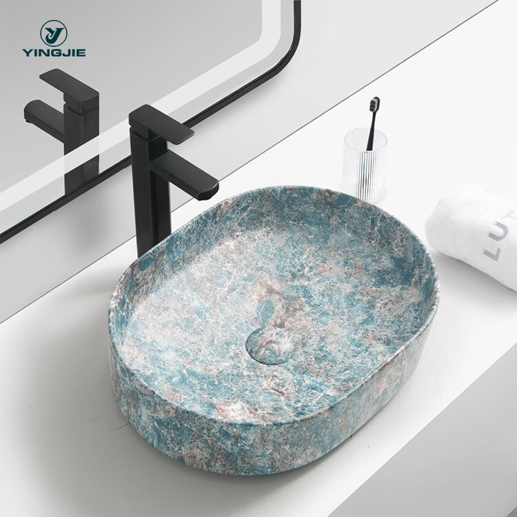 luxury hotel ceramic bathroom sinks with hand art designs marble wash basin sink supplier