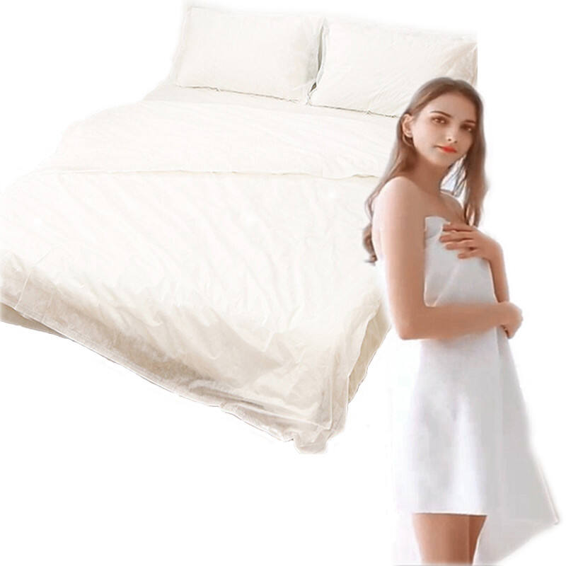 Wholesale plastic clean hotel travel disposable non-woven towel pillowcase bedding bed sheets set