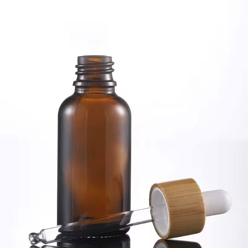 Amber packaging essential oil OEM /ODM glass packaging container bamboo cap Dropper bottle manufacturer details