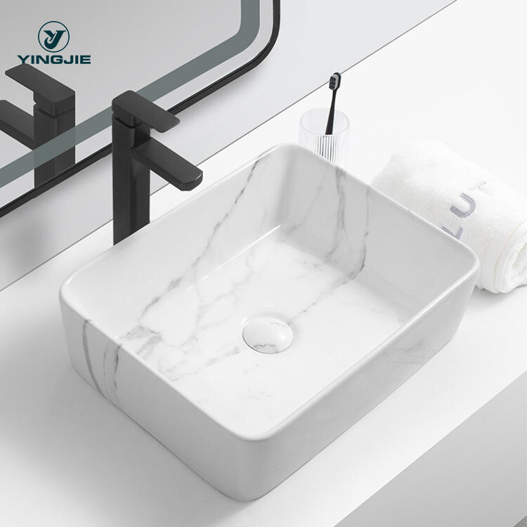 Natural Clean Simple White Marble Ceramic Sinks Art Basin Counter Top Wash Basin factory