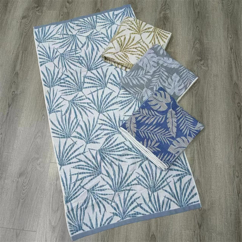 Custom LOGO Soft Absorbent Palm Leaf Pattern 100% Cotton Jacquard Bath Shower Towels for Home Beach Towels Spa Body Wrap Towels supplier