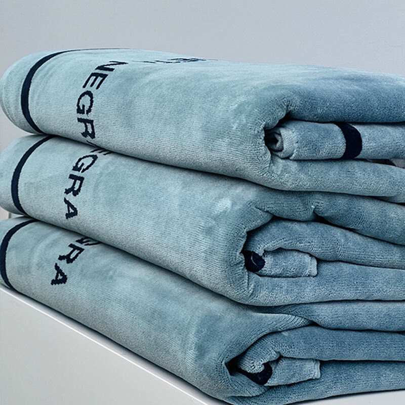 HOT Selling luxury 100% cotton Embroidery swimming towel super soft Water absorption beach towel factory