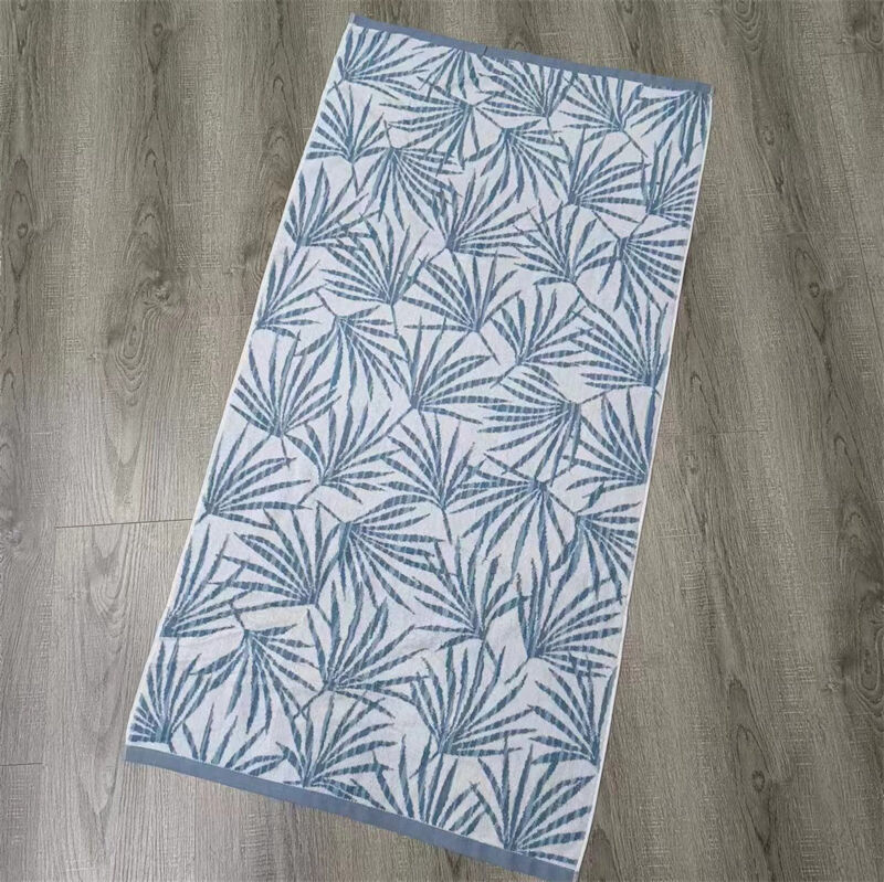 Custom LOGO Soft Absorbent Palm Leaf Pattern 100% Cotton Jacquard Bath Shower Towels for Home Beach Towels Spa Body Wrap Towels supplier