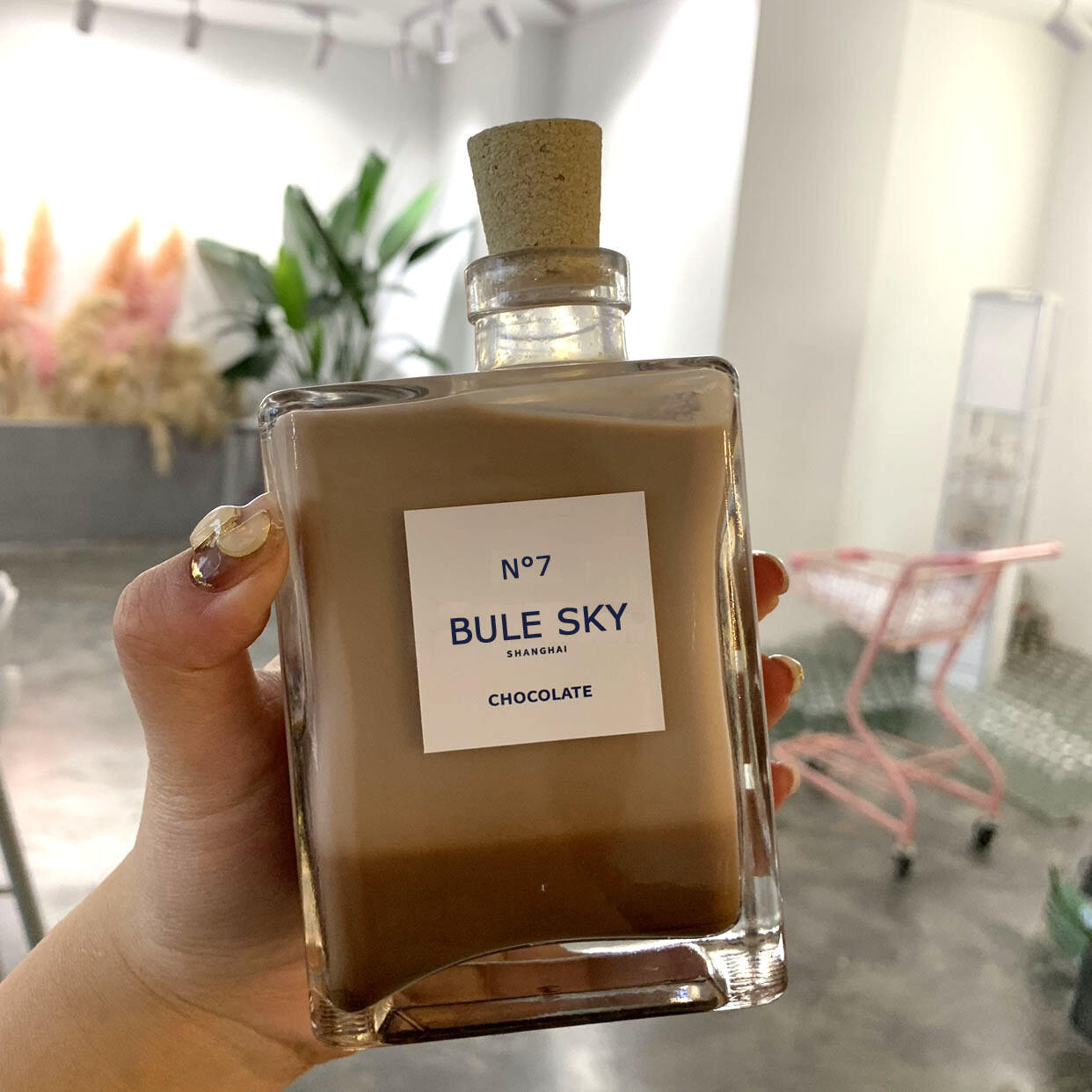 Glass bottle with crok