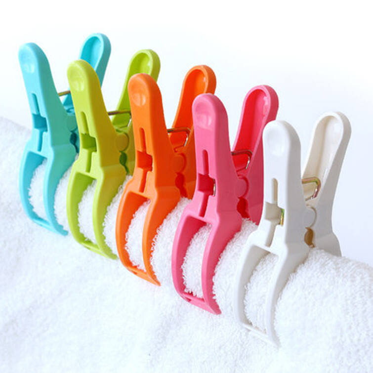 Elastic clothespin medium clip windproof quilt clip Multi-functional fixed plastic clothespin drying pants toy clip manufacture